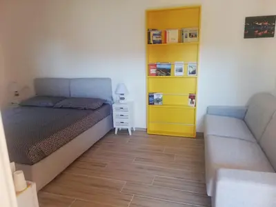 Area soggiorno di Flamingo Guest House- Rooms