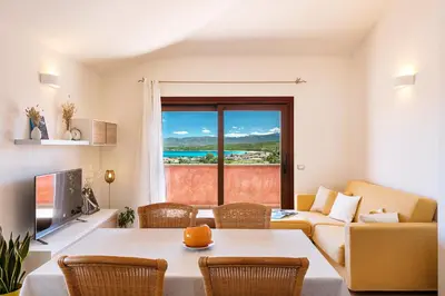 Area soggiorno di Homey Experience - Terrace Sea View Apartment
