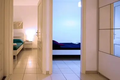 Letto o letti in una camera di Downtown Garden Olbia