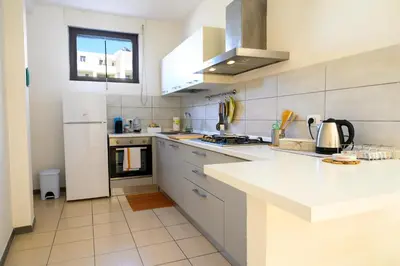 Cucina o angolo cottura di Downtown Garden Olbia