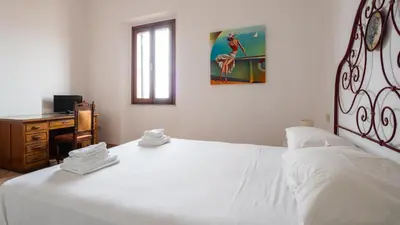 Letto o letti in una camera di Welcomely - Isole Apartments