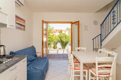 Balcone o terrazza di Appartamento Residenziale Trilocale 4 posti letto via Oristano