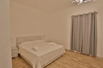 Letto o letti in una camera di Les Chambres Au Centre