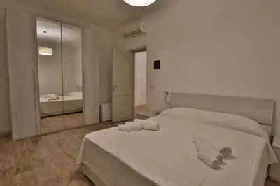 Letto o letti in una camera di Les Chambres Au Centre