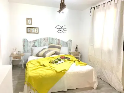 Letto o letti in una camera di Casa Murales