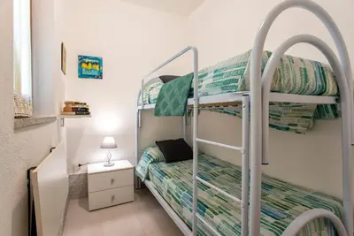 Letto o letti in una camera di Casa Marinella