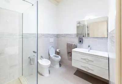 Bagno di La Promenade Rooms & Suites