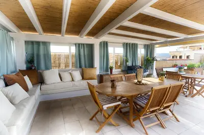 Area soggiorno di Terrace Rooms Olbia Center