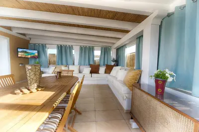 Area soggiorno di Terrace Rooms Olbia Center