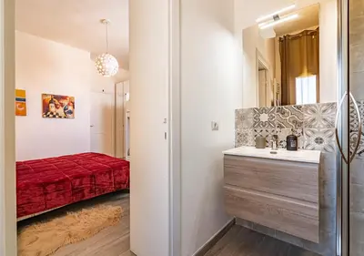 Letto o letti in una camera di Terrace Rooms Olbia Center