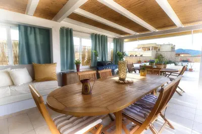 Area soggiorno di Terrace Rooms Olbia Center