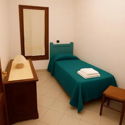 Letto o letti in una camera di Casa Vacanze Orosei