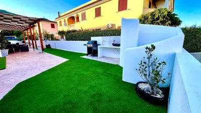 Giardino di Le residenze del mare 6 Camera con cucina