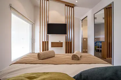 Letto o letti in una camera di Montepetrosu Charming House