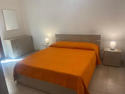 Letto o letti in una camera di Le Villette di Budoni e dintorni