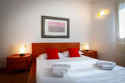 Letto o letti in una camera di Villa Cedrino