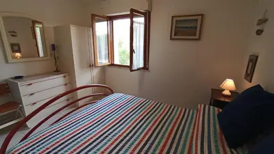 Letto o letti in una camera di Sa Prama Beach