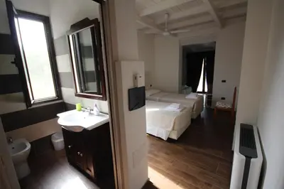 Letto o letti in una camera di Villa La Conchiglia Rooms