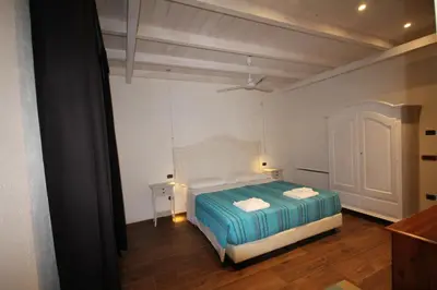 Letto o letti in una camera di Villa La Conchiglia Rooms