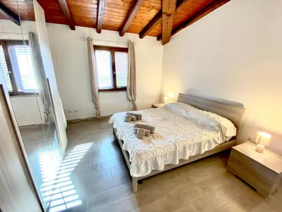 Letto o letti in una camera di Gabbas House Tanaunella