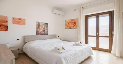 Letto o letti in una camera di Dimoras 3BR City Center Terrace & Parking