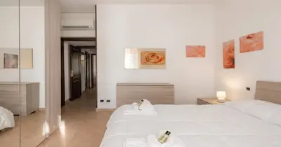 Letto o letti in una camera di Dimoras 3BR City Center Terrace & Parking
