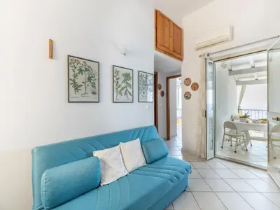 Area soggiorno di Apartment in Cala Gonone by Dolce Acqua Cliff