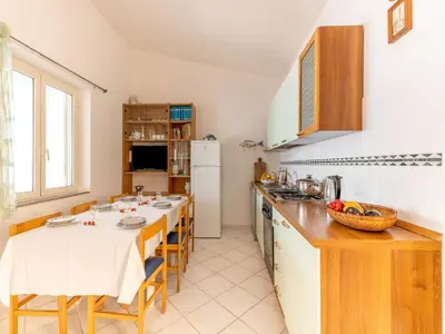 Cucina o angolo cottura di Apartment in Cala Gonone by Dolce Acqua Cliff