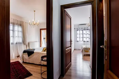 Letto o letti in una camera di Appartamento San Teodoro centro