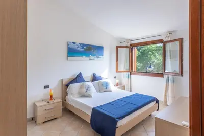 Letto o letti in una camera di Villino il Faretto Spiaggia