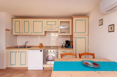 Cucina o angolo cottura di Appartamento Lu Fraili