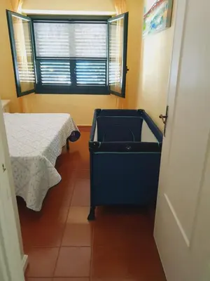 Letto o letti in una camera di Villa Maris