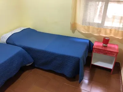 Letto o letti in una camera di Villa Maris
