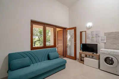 Area soggiorno di Residence Li Menduli