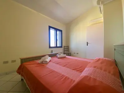 Letto o letti in una camera di Le Residenze di Monte Rena A1 - A2