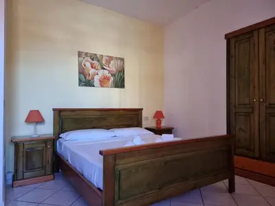 Letto o letti in una camera di Le Residenze di Monte Rena A1 - A2