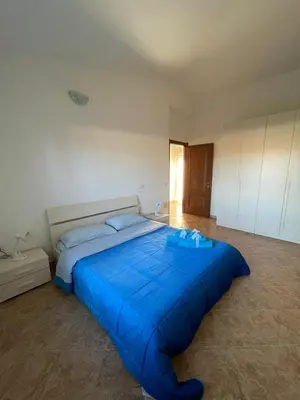 Letto o letti in una camera di Case Vacanza Onda e Riva