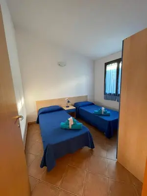 Letto o letti in una camera di Case Vacanze Sole e Luna