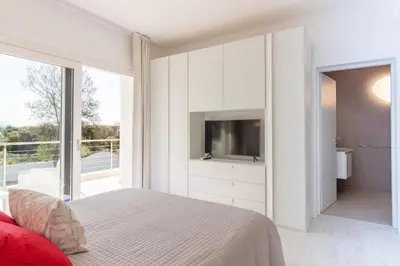 Letto o letti in una camera di Villa Mary