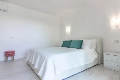 Letto o letti in una camera di Villa Mary