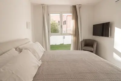 Letto o letti in una camera di Villa Mary