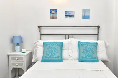 Letto o letti in una camera di Residence Chiaro di Luna