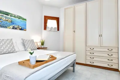 Letto o letti in una camera di Residence Chiaro di Luna