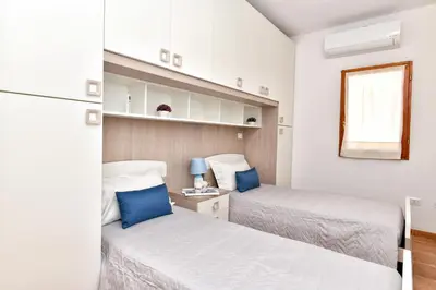 Letto o letti in una camera di Residence Chiaro di Luna