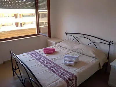 Letto o letti in una camera di Casa Speranza