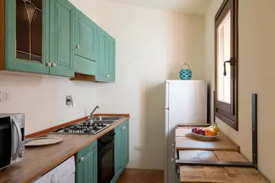 Cucina o angolo cottura di Le case del golfo - Your House in Sardinia