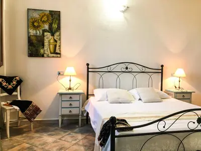Letto o letti in una camera di Sas Tilibbas-Ammentos Posada