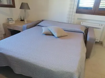 Letto o letti in una camera di La LocanDina