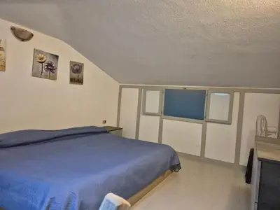 Letto o letti in una camera di Casa Elias