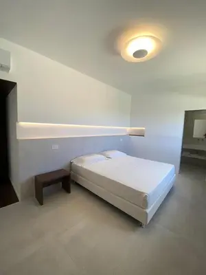 Letto o letti in una camera di Domo La Vela